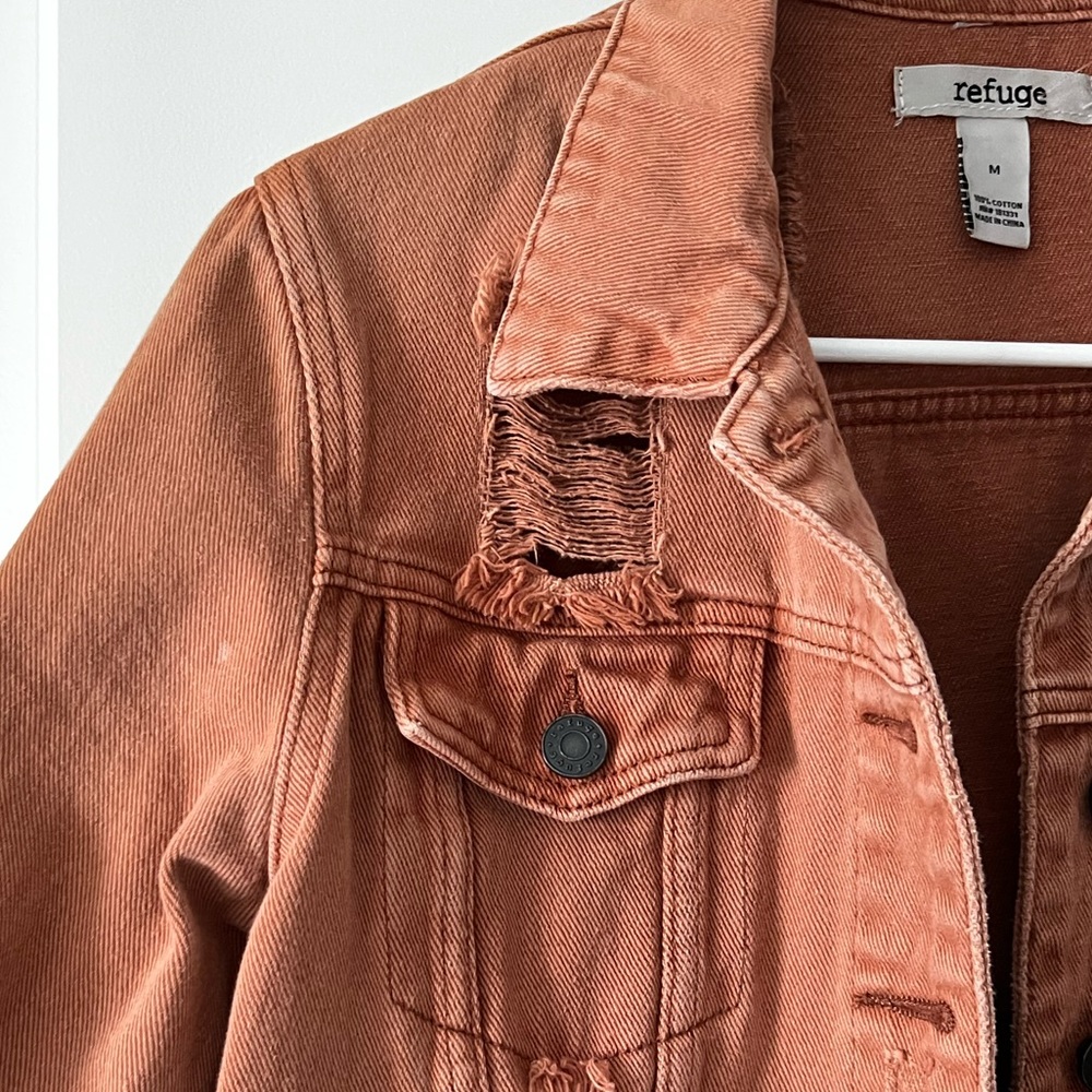 Distressed jean jacket